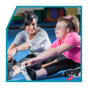 2 people stretching their legs.