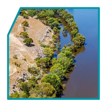 A picture of land and a river from above.