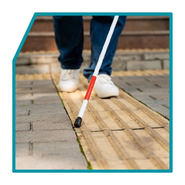A person using a white cane.